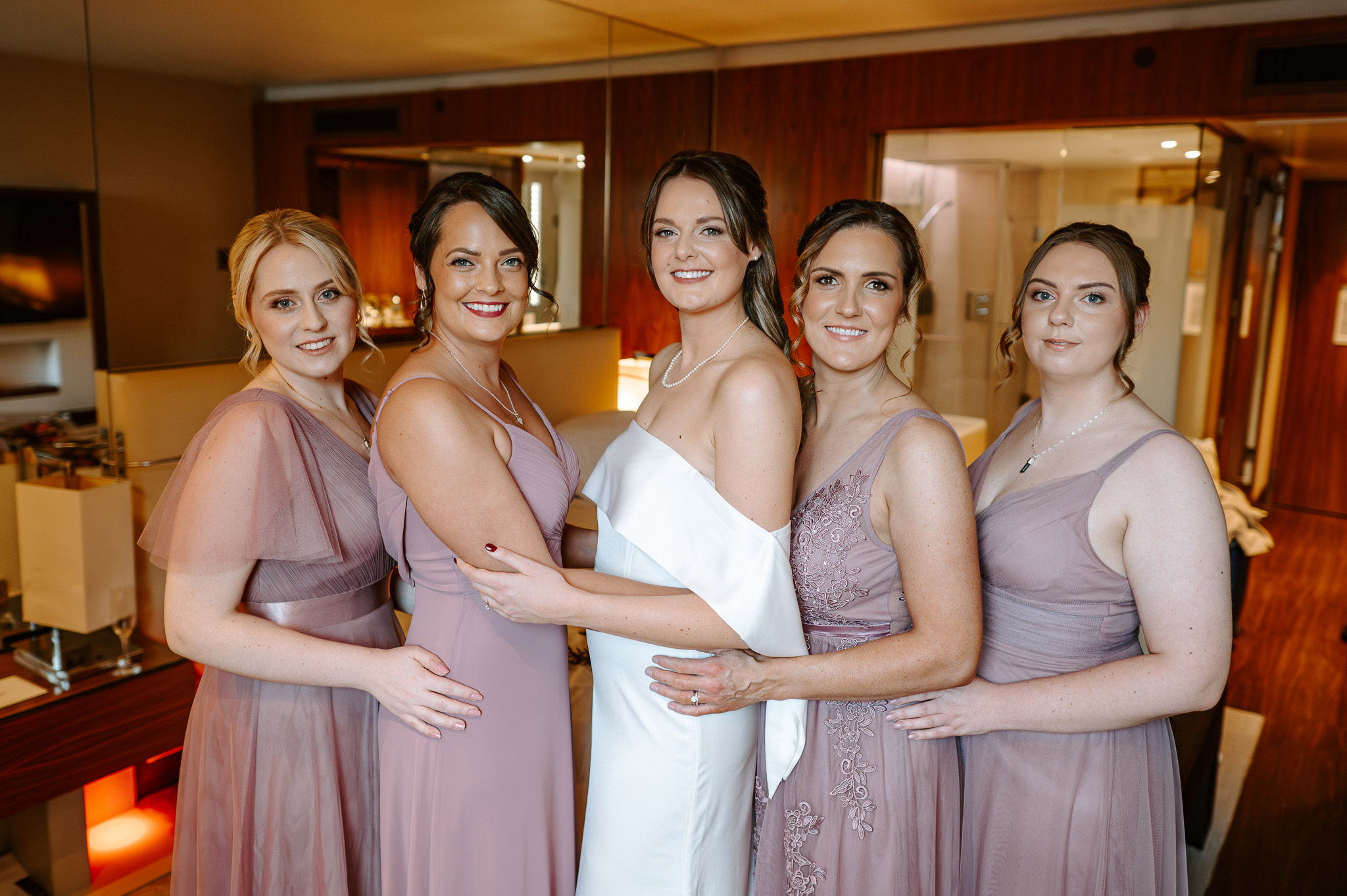 Wedding preparation photoshoot with bride and bridesmaids 