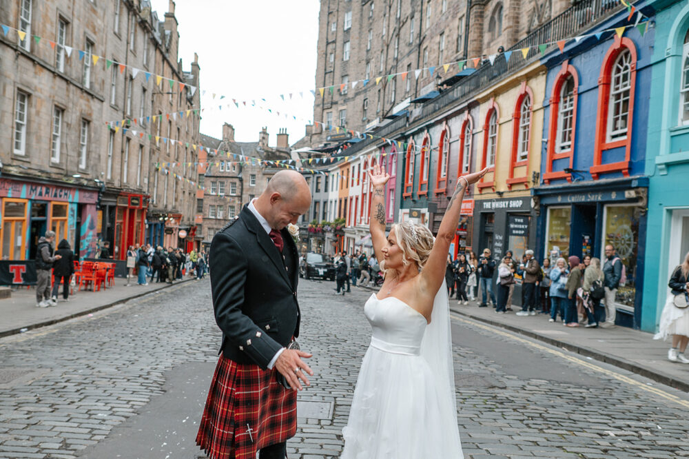 Bride and groom during their wedding photoshoot on Victoria Street in Edinburgh