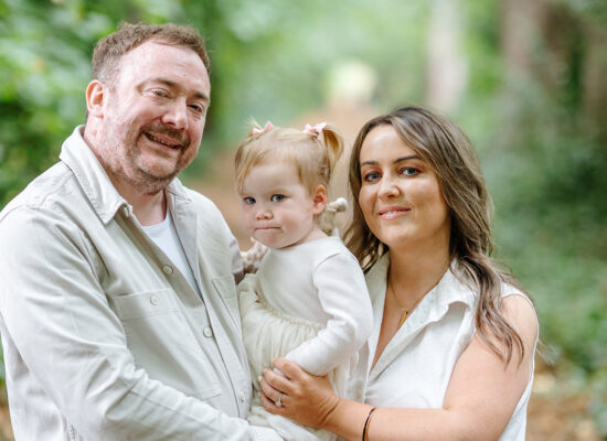 Katie, David and their daughter Bella enjoying a family picnic photoshoot at Lauriston Castle, Edinburgh