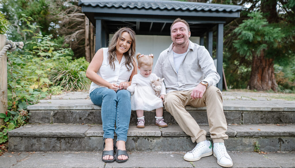 Family photoshoot on the steps at Lauriston Castle in Edinburgh with parents and toddler
