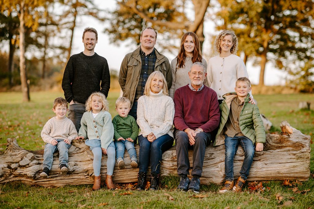 Multi-generation family portrait with grandparents, parents and children at Dalkeith Country Park