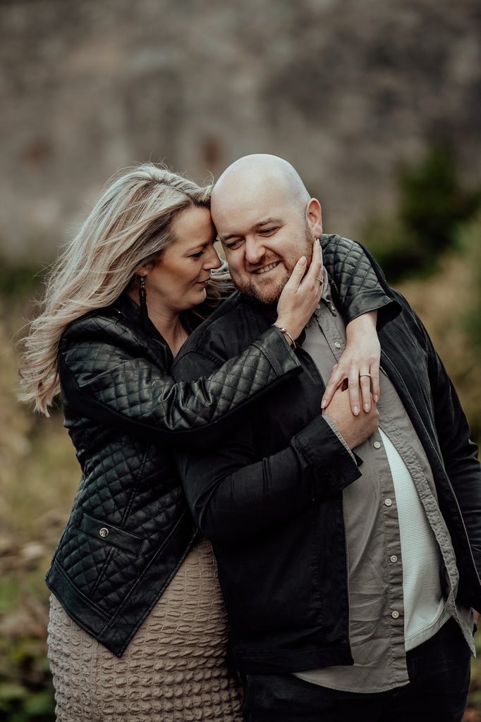 Jenna and Mike sharing a relaxed moment during their Saughton Park photoshoot